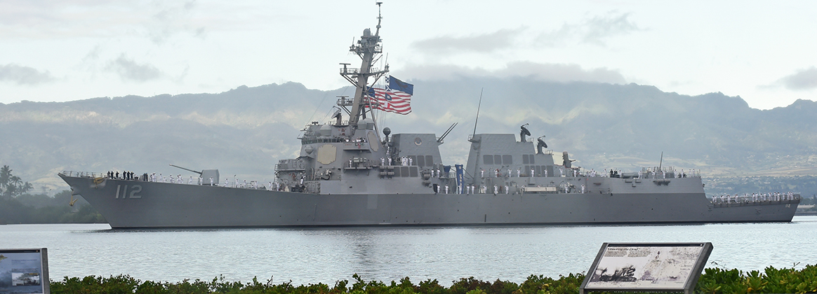USS Michael Murphy (DDG112) renders honors during the National Pearl Harbor Remembrance Day 77th Anniversary Commemoration.